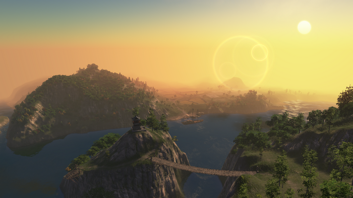 Misty landscape with islands and a pagoda at sunrise