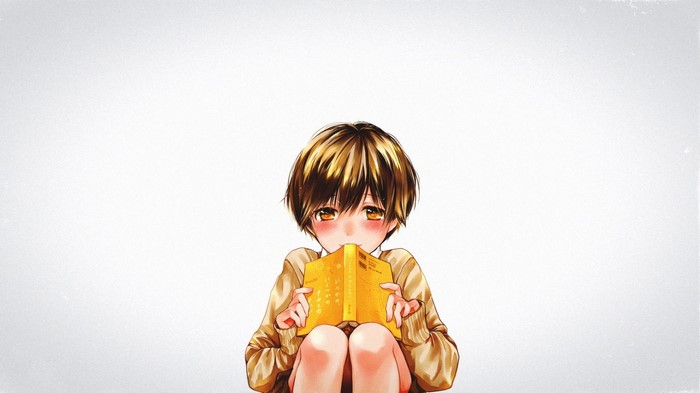 Anime boy reading a yellow book