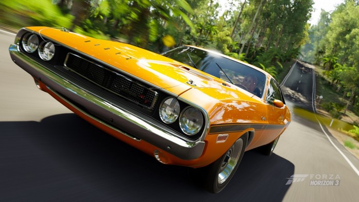 Orange Dodge Challenger driving on a road in Forza Horizon 3