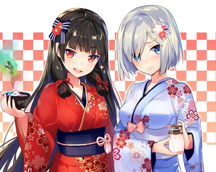Two girls in yukatas with food
