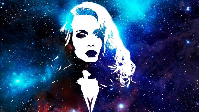 Woman silhouette against a galaxy background
