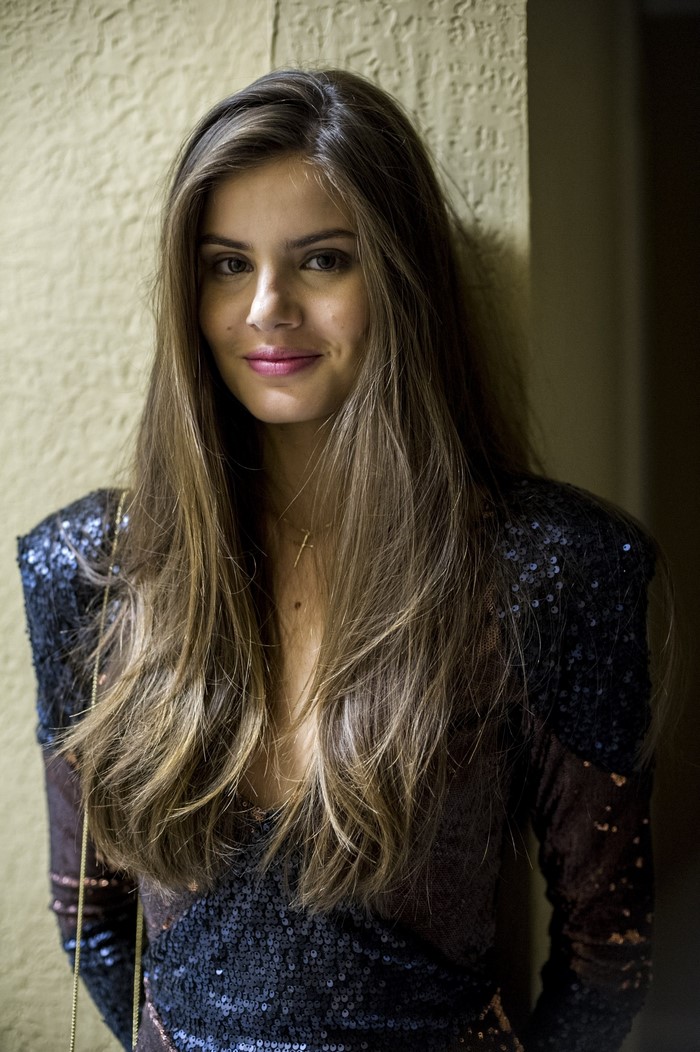 Portrait of a Smiling Woman with Long Hair