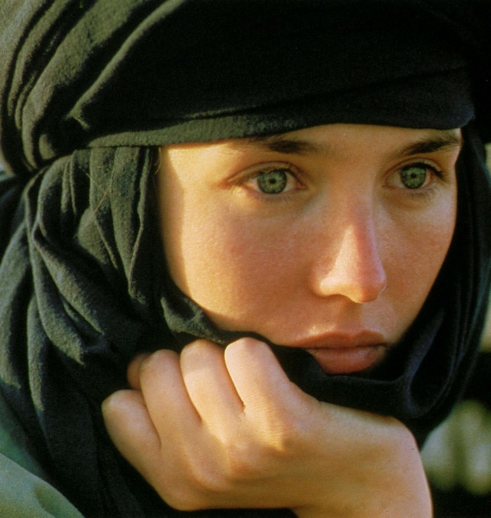 Isabelle Adjani wearing a black headscarf