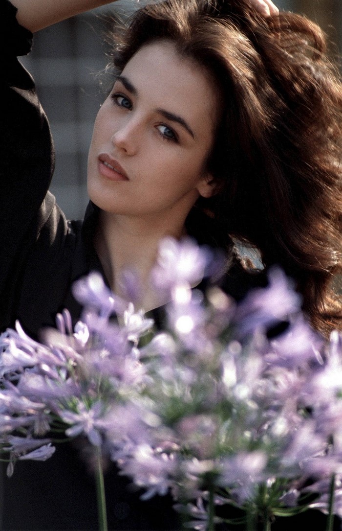 Isabelle Adjani with purple flowers