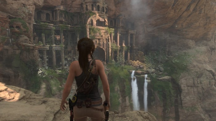 Lara Croft from Tomb Raider in front of ancient ruins and waterfalls