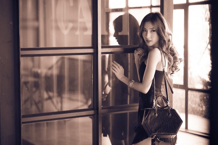 Model Atita Wittayakajohndet in Sepia Toned Fashion Photo