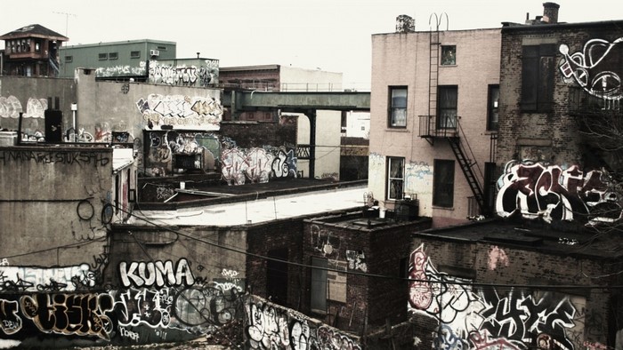 Graffiti-covered buildings and urban infrastructure