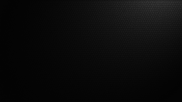 Black textured surface with light and shadow