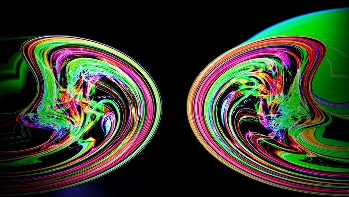 Abstract colorful swirling vortex on black background