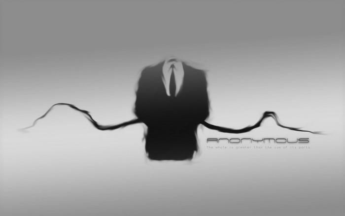Anonymous figure in a suit with text