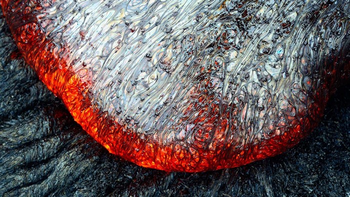 Close-up of flowing lava with intricate patterns