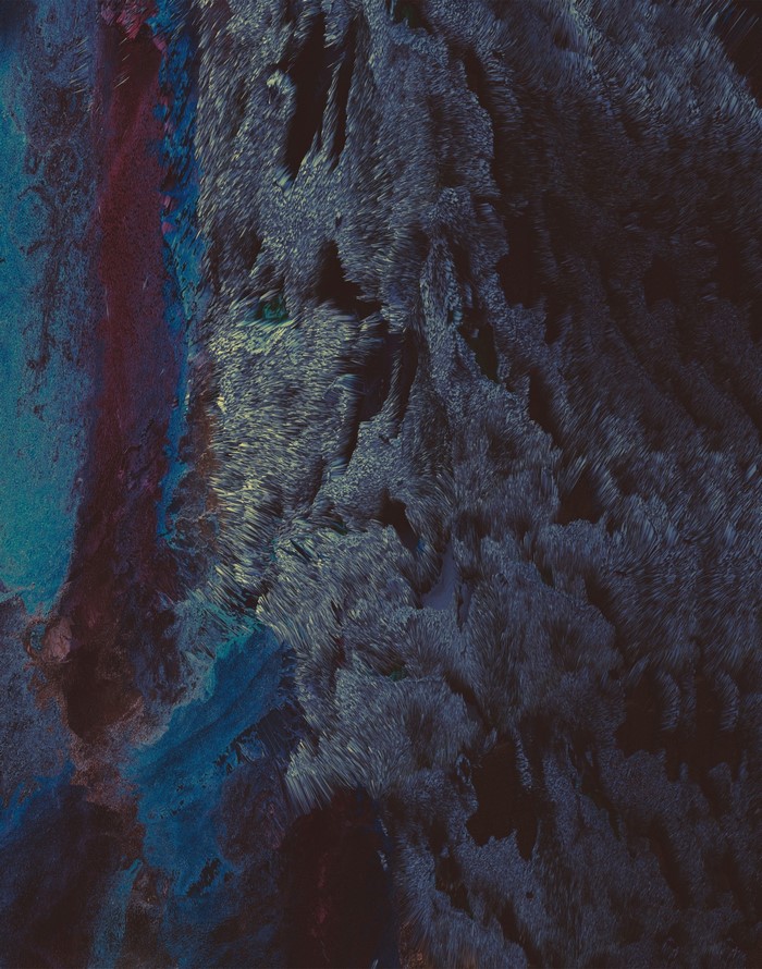 Abstract blue and dark gray textured formation