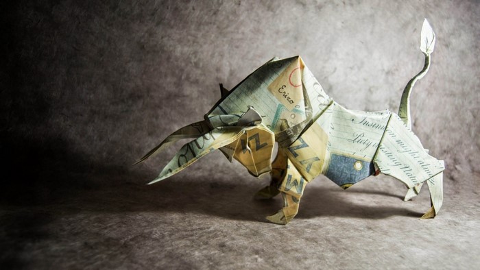 Origami bull made from paper money