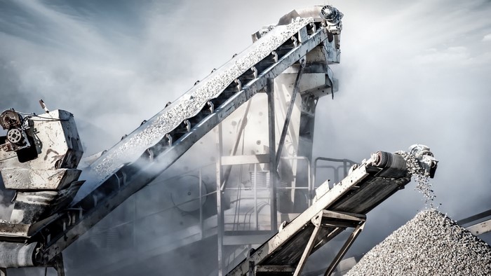 Industrial conveyor belts processing gravel