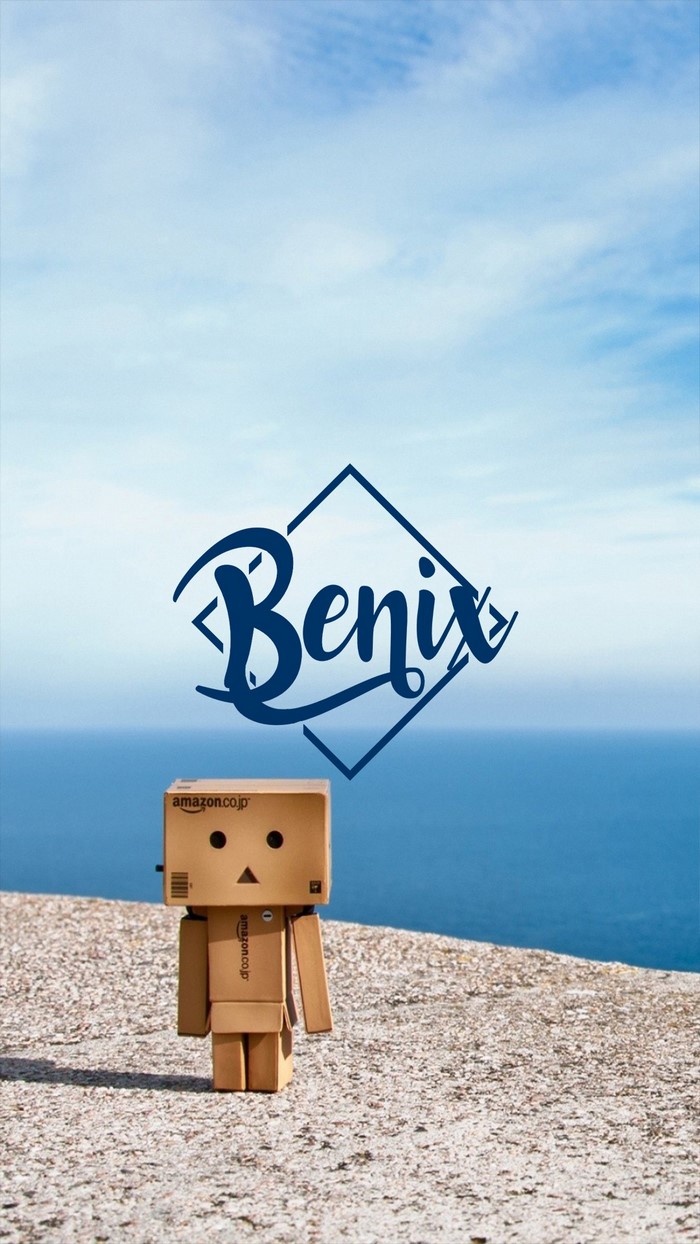 Danbo robot with Benix logo by the sea