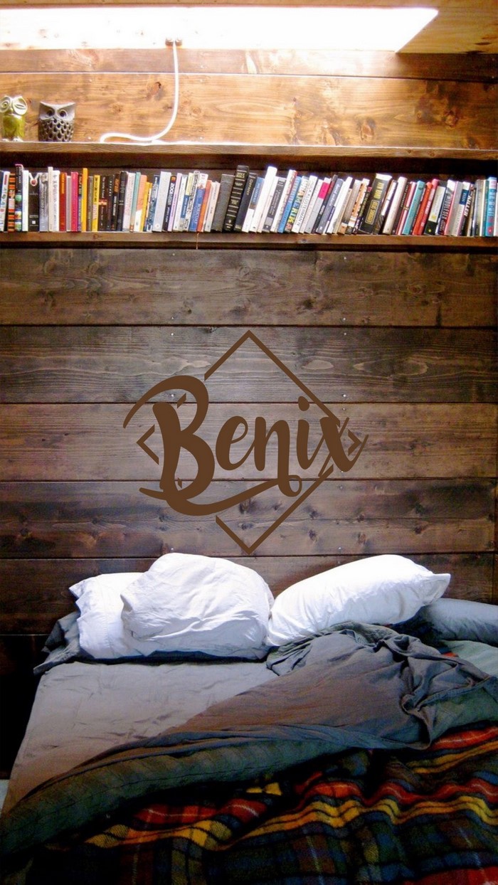 Bedroom with wooden wall and bookshelf