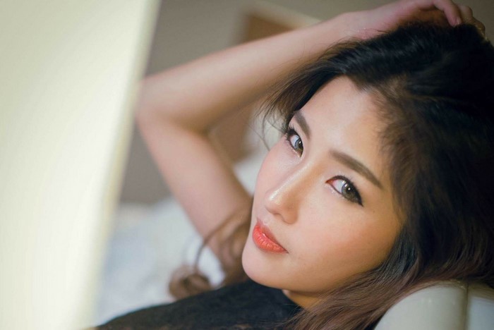 Portrait of a beautiful Asian woman with long hair