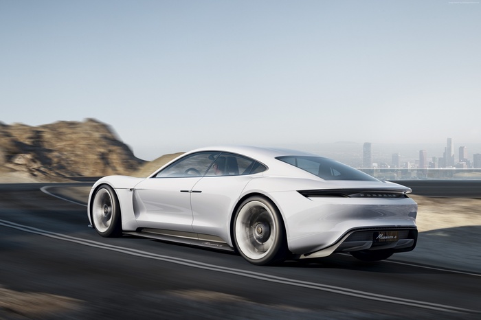 White Porsche Taycan Mission E 4 electric supercar on road