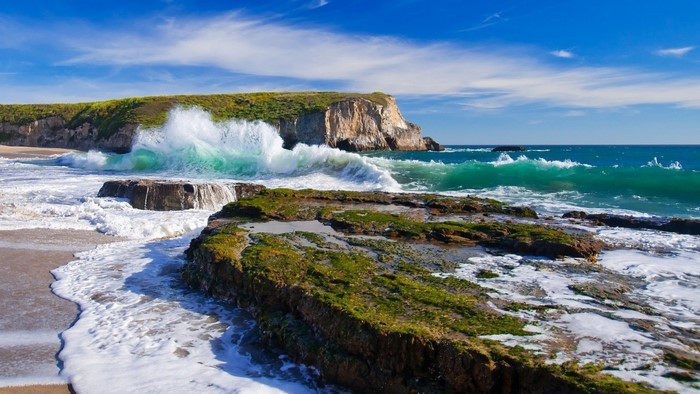 Waves Crashing on Rocky Coastal Shoreline