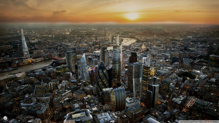Aerial view of London skyline at sunset