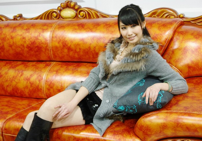 Diana Xu sitting on a couch