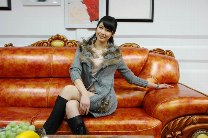 Diana Xu sitting on a couch