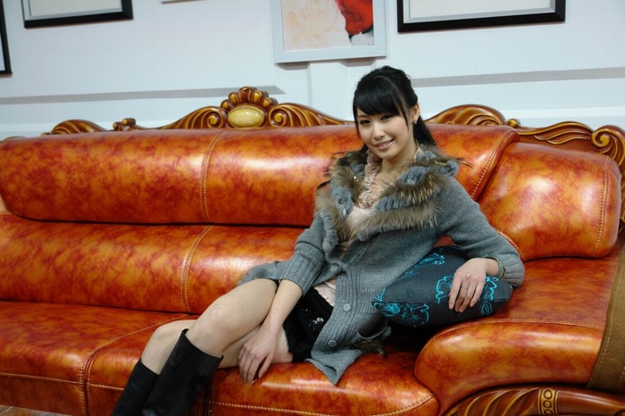 Diana Xu sitting on a couch