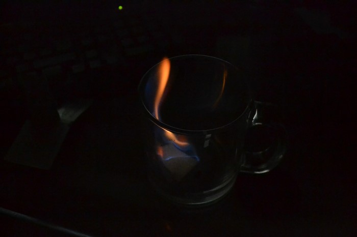 Glass mug with fire inside