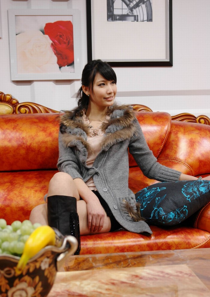 Diana Xu sitting on a couch