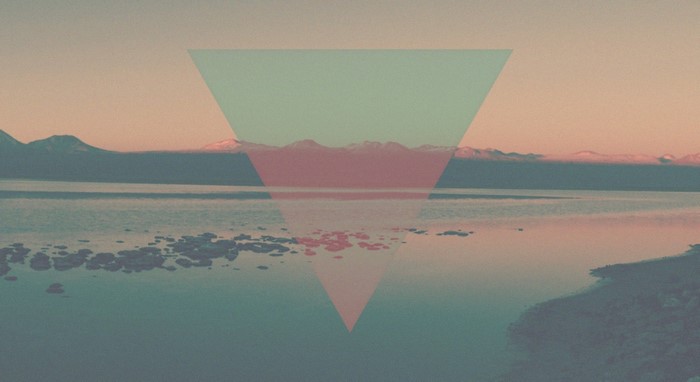 Geometric overlay on a desert lake at sunset