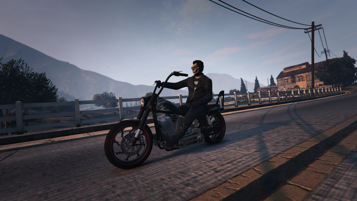 Man in skull mask riding a motorcycle in Grand Theft Auto V