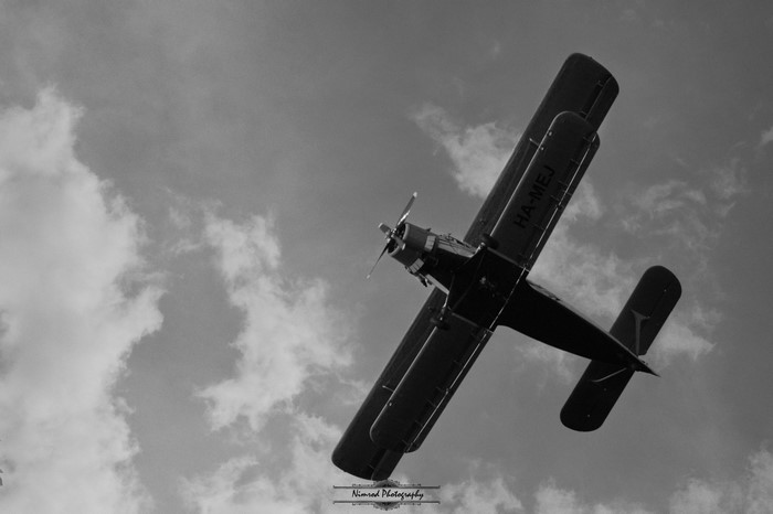 Biplane flying in the sky