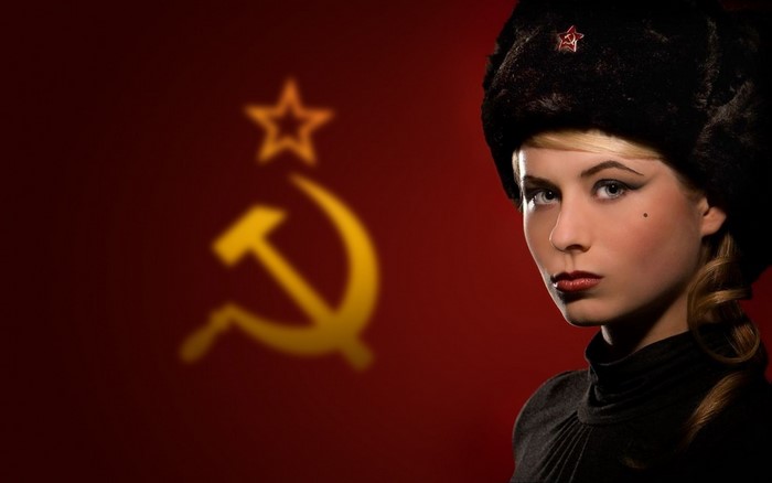 Young Woman in Russian Ushanka with Soviet Symbol