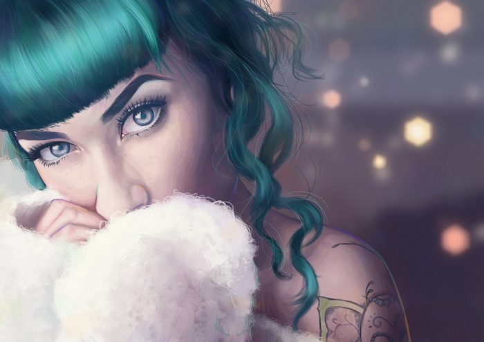 Close-up portrait of a woman with green hair and tattoos