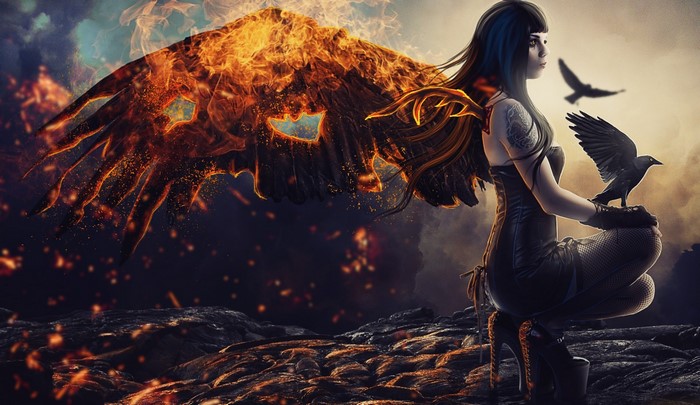 Woman with fiery wings and ravens