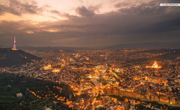 Aerial view of Tbilisi, Georgia at sunset with TV tower