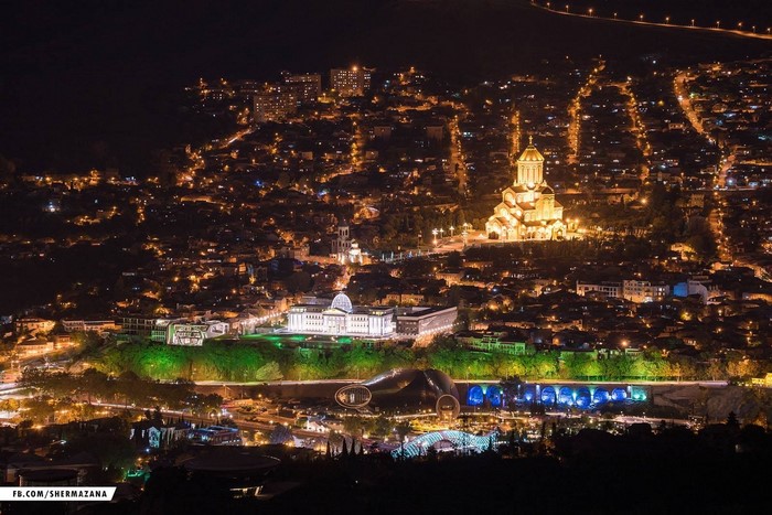 Night cityscape of Tbilisi, Georgia with illuminated landmarks