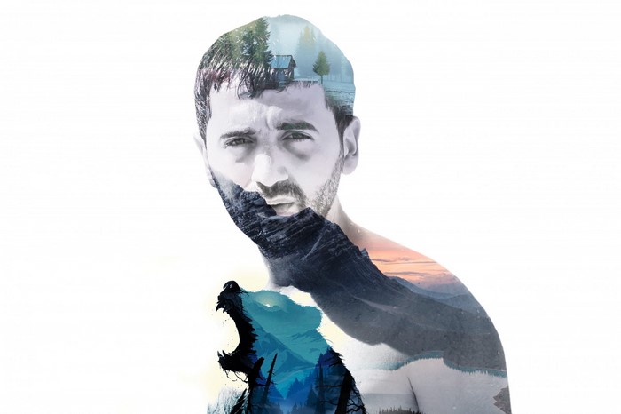 Double exposure portrait of a man with nature scenes