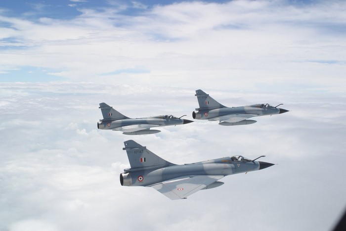 Three Indian Air Force Dassault Mirage 2000 fighter jets flying in formation