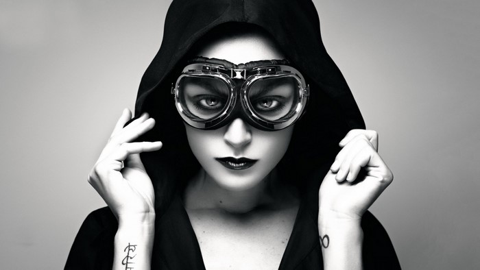 Woman wearing goggles and hood
