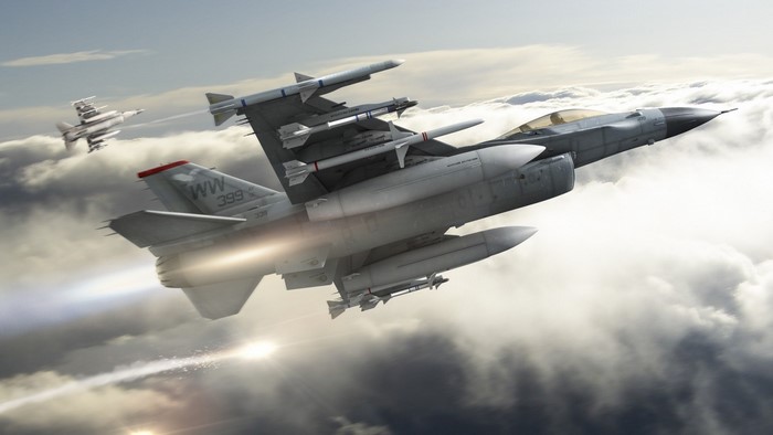 Fighter jets in flight above clouds
