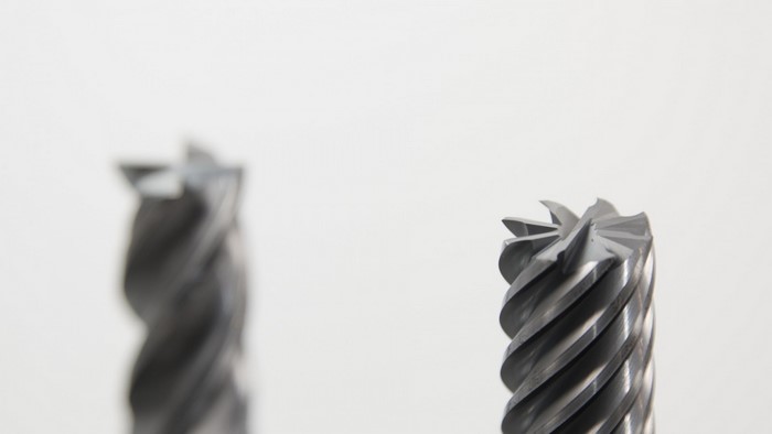 Two metal milling tools with spiral flutes