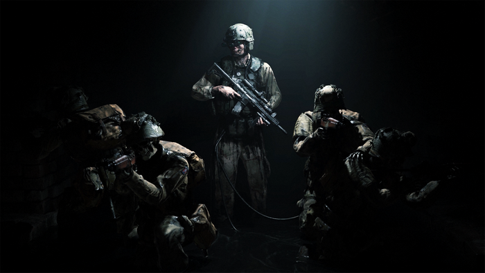 Soldiers in tactical gear in darkness