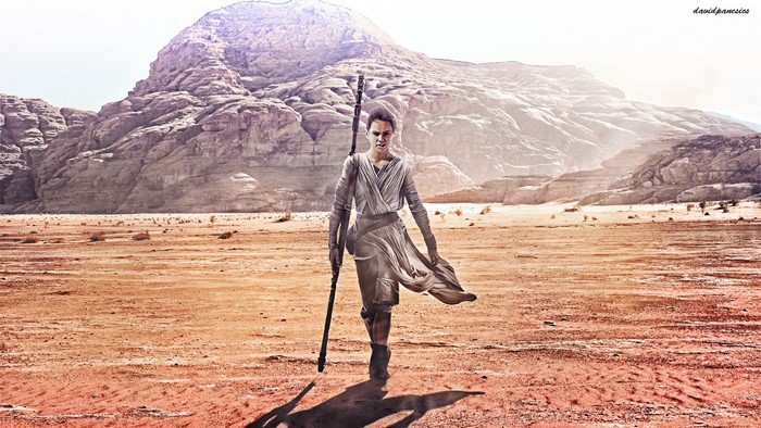 Rey from Star Wars walking in a desert landscape
