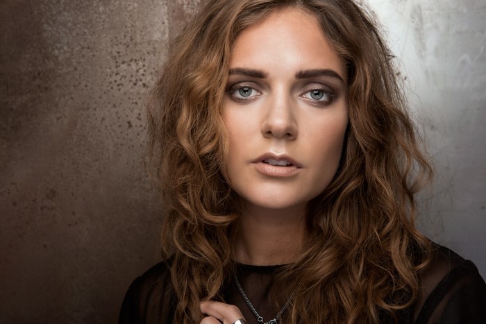 Tove Lo portrait with curly brown hair