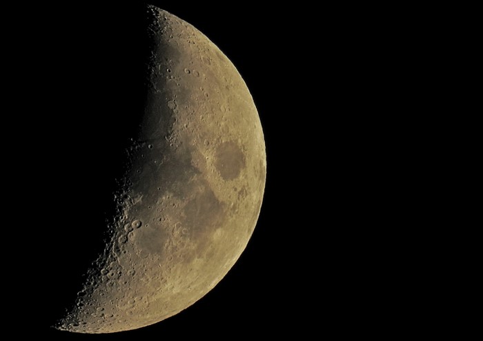 The Moon with visible craters and terminator