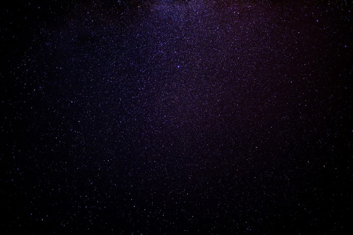 Night sky full of stars and a nebula