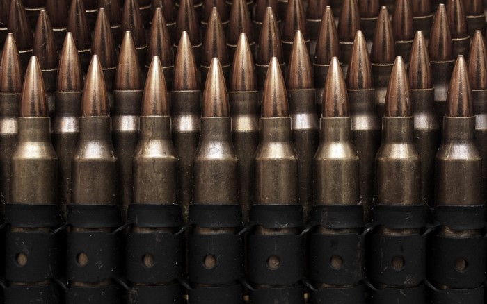 Rows of rifle cartridges in a belt