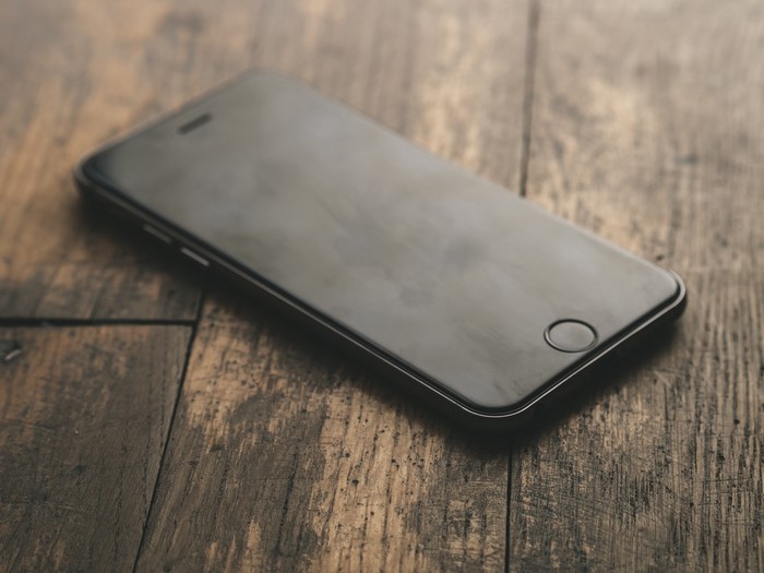iPhone on a wooden table