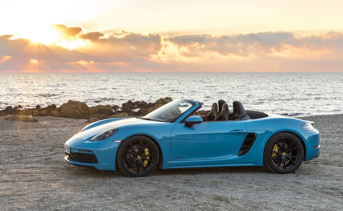 Porsche 718 Boxster GTS convertible on beach